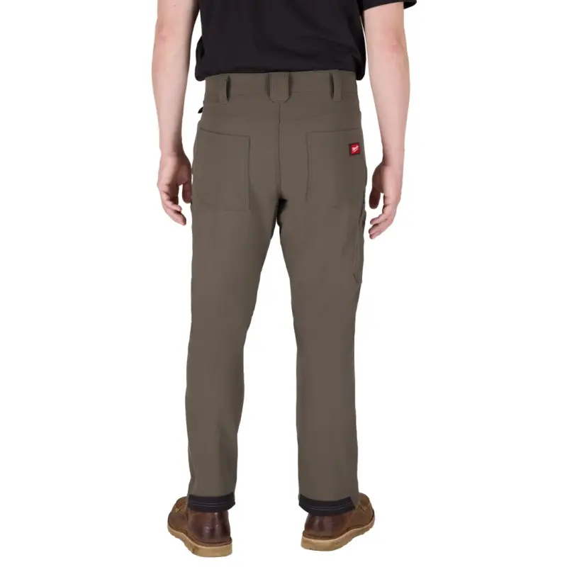 Pracovní kalhoty MILWAUKEE FREEFLEX Stretch, hnědé, Vel. 62/XXXL, 4932502060